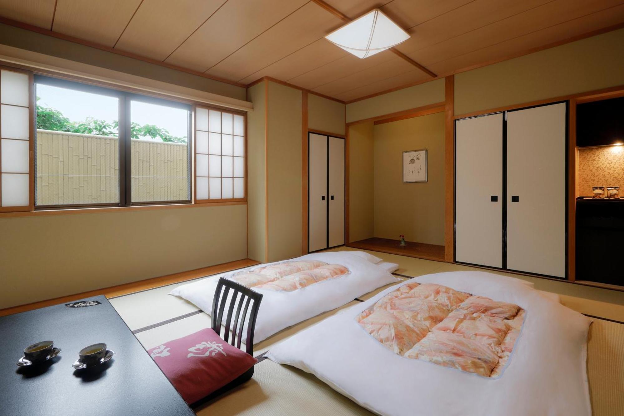 Gion Ryokan Karaku Киото Экстерьер фото