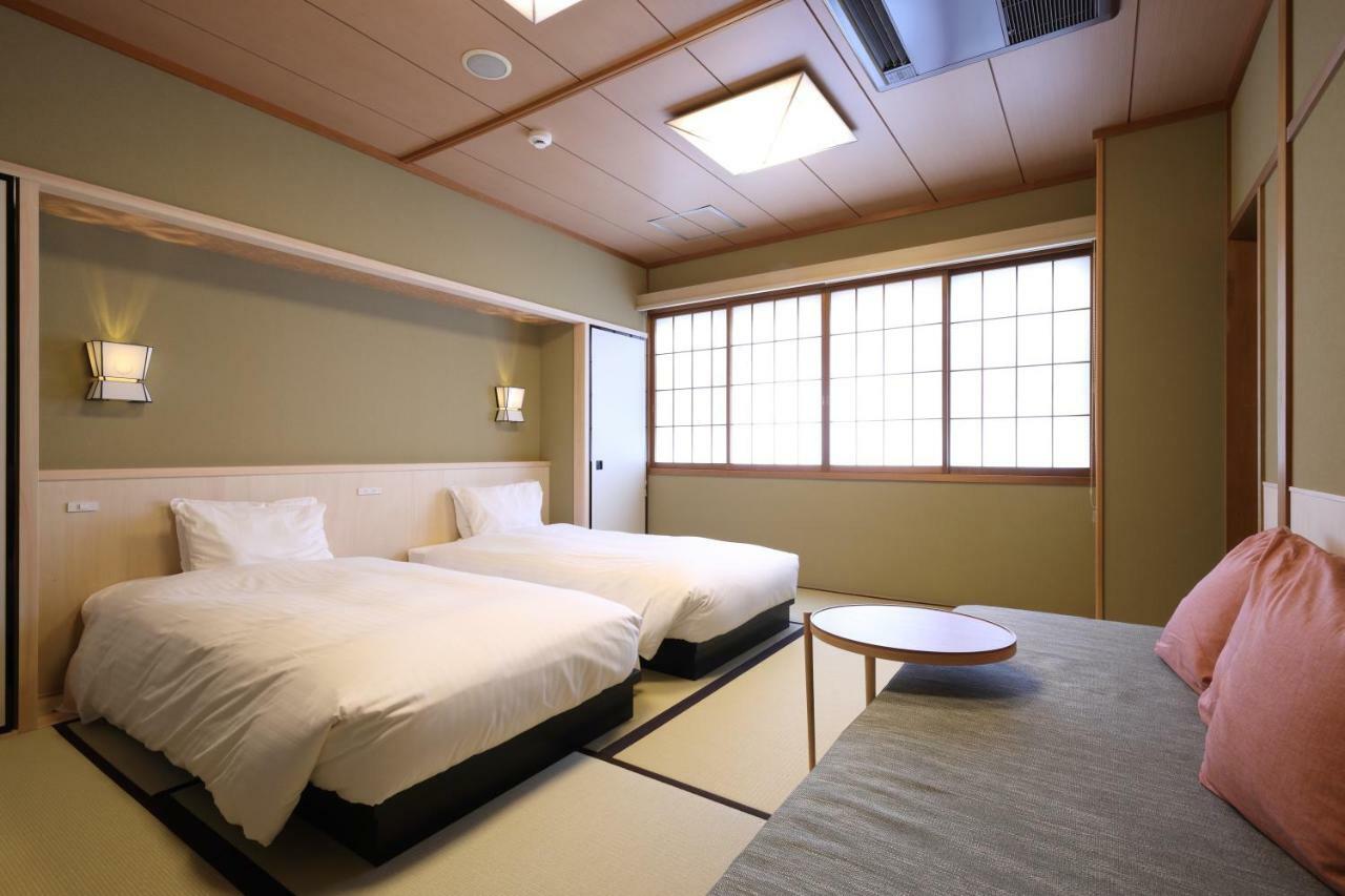 Gion Ryokan Karaku Киото Экстерьер фото
