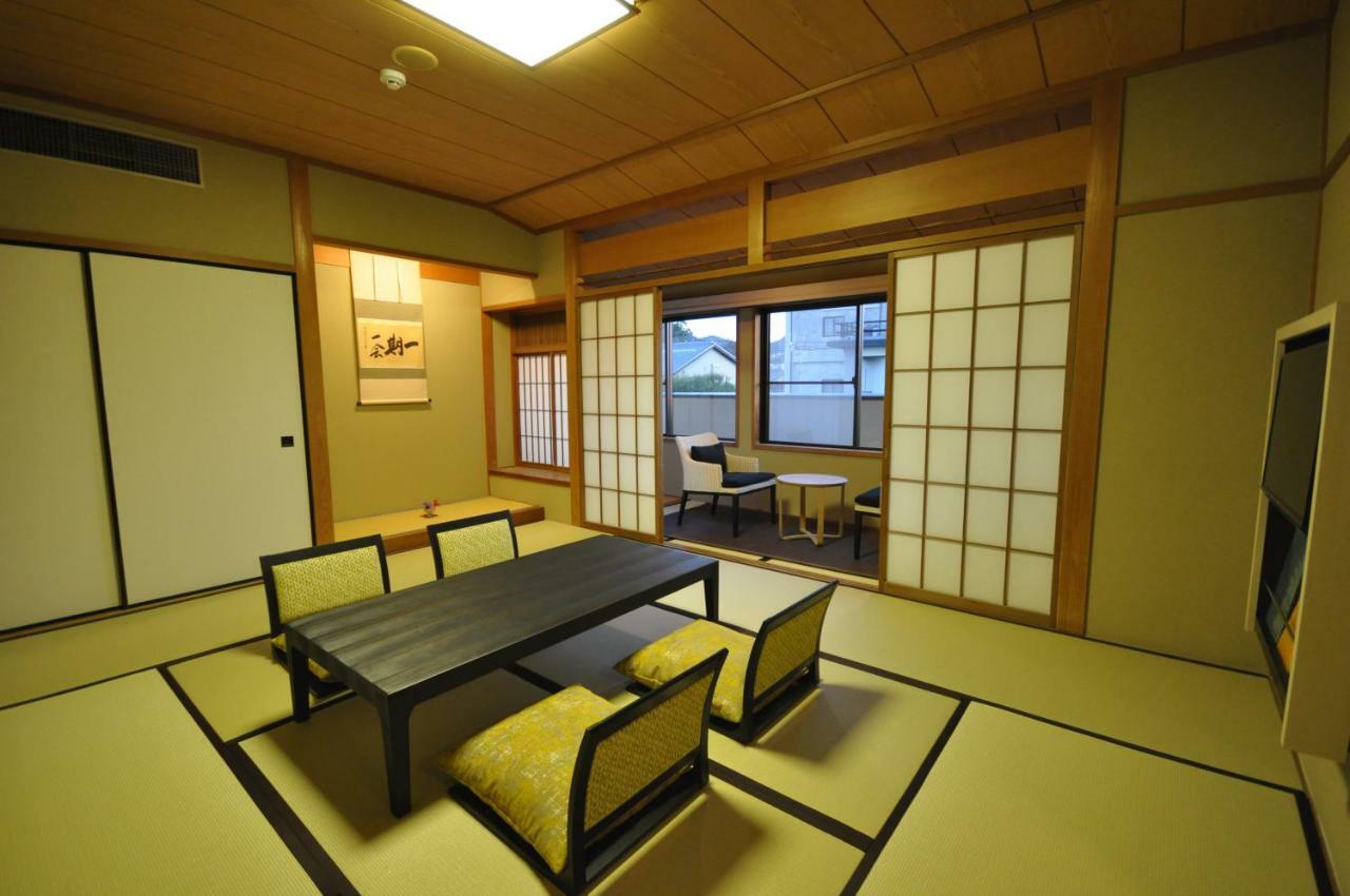 Gion Ryokan Karaku Киото Экстерьер фото